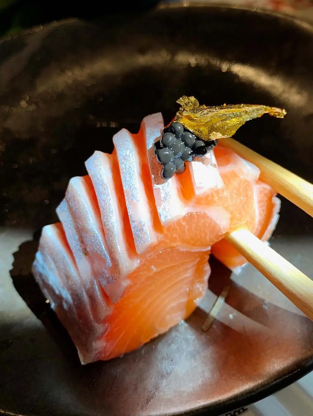 Chef preparing sushi at Cho Cho San